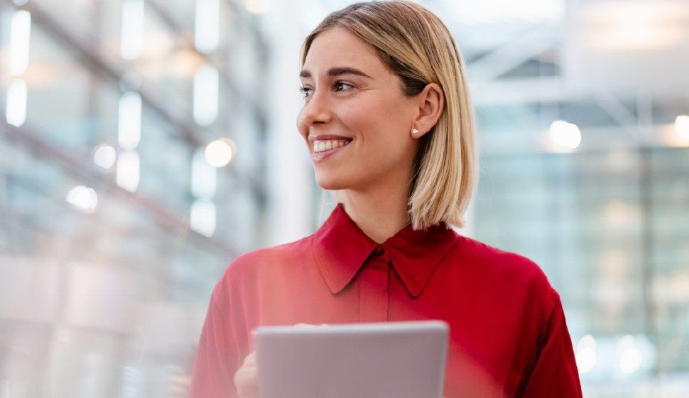 Enterprise Communication Evolution: Avaya’s Infinity Platform Bridges the Gap Between What’s Needed Today and Expected Tomorrow Woman holding tablet