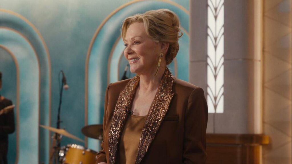 A woman with an updo smiling