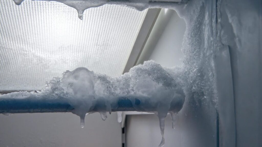 Ice and frost inside freezer