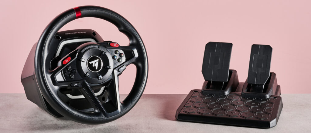 Thrustmaster T128 review: a very capable wheel for the price, but don’t expect a premium design Thrustmaster T128 on desk with pink background