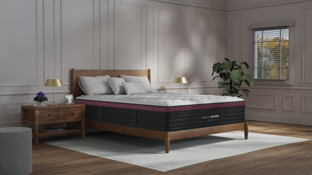 New Helix Dusk Luxe mattress in a subtly-lit room on top of a brown, low-profile base with a headboard