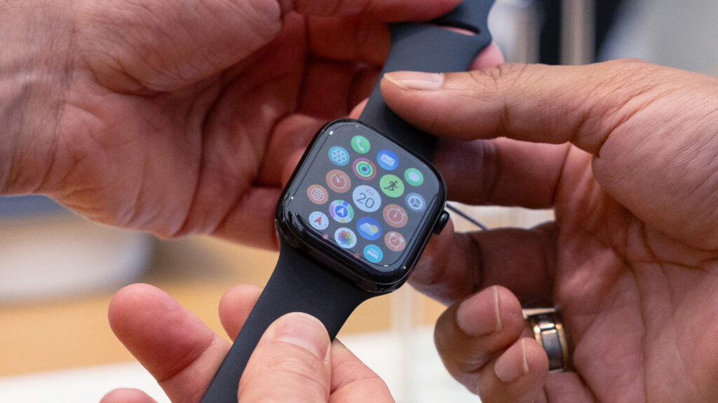 Apple Watch Series 10 being held in a hand