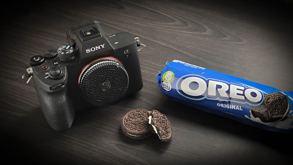 I took photos of the most famous painting in the world, with the worst lens I’ve ever used A photo of the 'Oreo' camera lens on a Sony A7 IV next to a packet of Oreo's