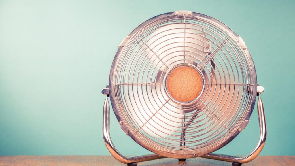 A round fan on a table