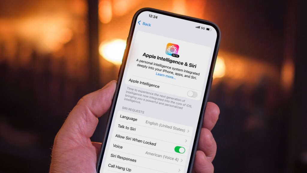 Hand holding an iPhone in front of a fireplace. On the phone is the Apple intelligence & Siri settings with Apple Intelligence turned off.