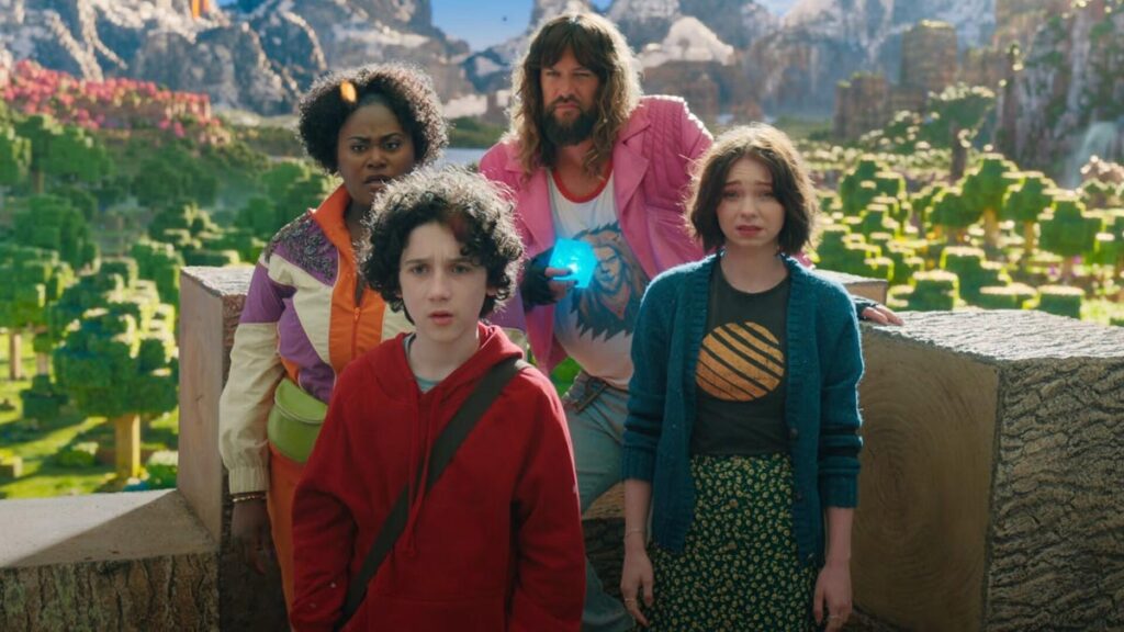 Four people standing together