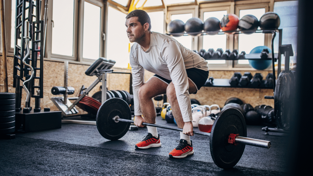A Sports Scientist says these ‘two underrated factors’ are sabotaging your gains A man performing a deadlift at the gym