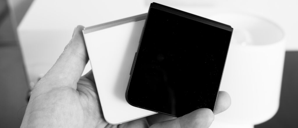Hands-on Samsung Galaxy Z Flip 7 review: the case of the missing bargain in black and white Two Samsung Galaxy Z Flip 7 FE devices in black and white closed in hand