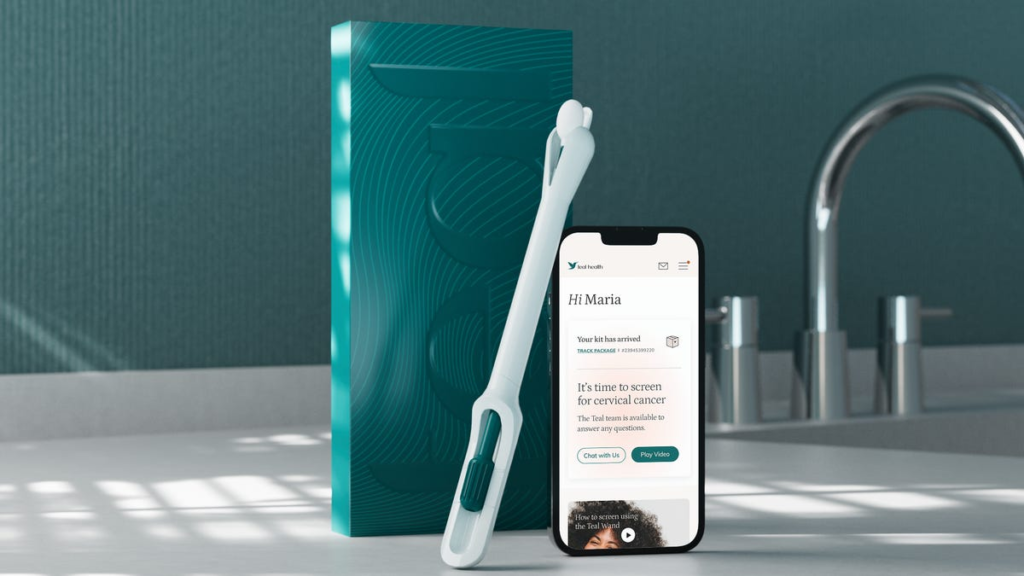 The First At-Home Cervical Cancer Screening Wand Is Now Available The Teal Wand next to an iPhone showing the Teal Health portal.