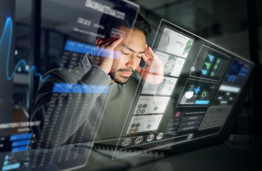 Cybersecurity management for boards: Metrics that matter Overlay, dashboard or trader with stress, headache or burnout from trading data, bad investment or stocks. Anxiety, debt or frustrated man with digital ui or ux on financial loss on screen at night