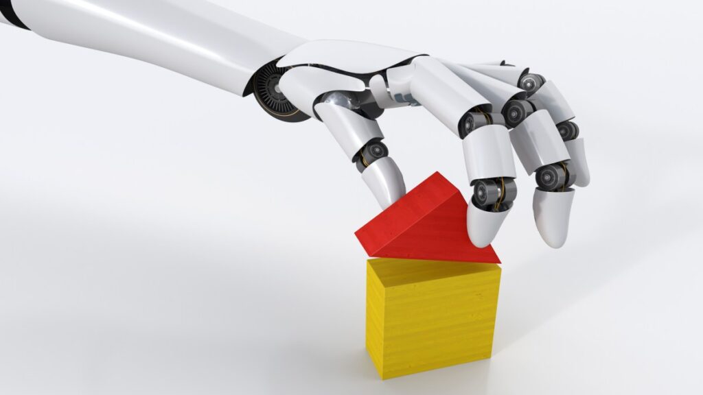 Anthropic, Blackstone bet the next trillion-dollar AI business is implementation, not models Robot hand building house with building blocks