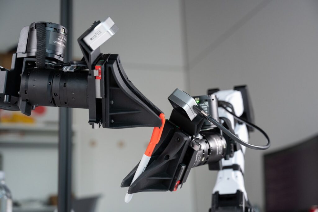 XDOF, just three months out of stealth, is in talks for a Series B at a $1.2B valuation XDOF's robotic arms manipulate a pen and cap.